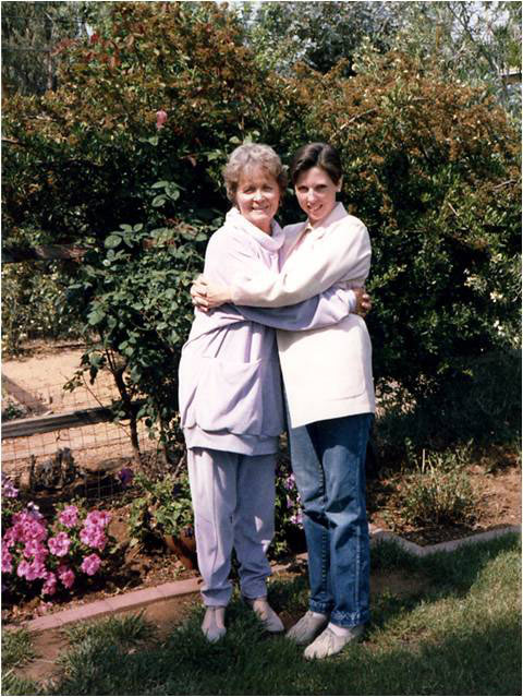 Mom in her rose garden.